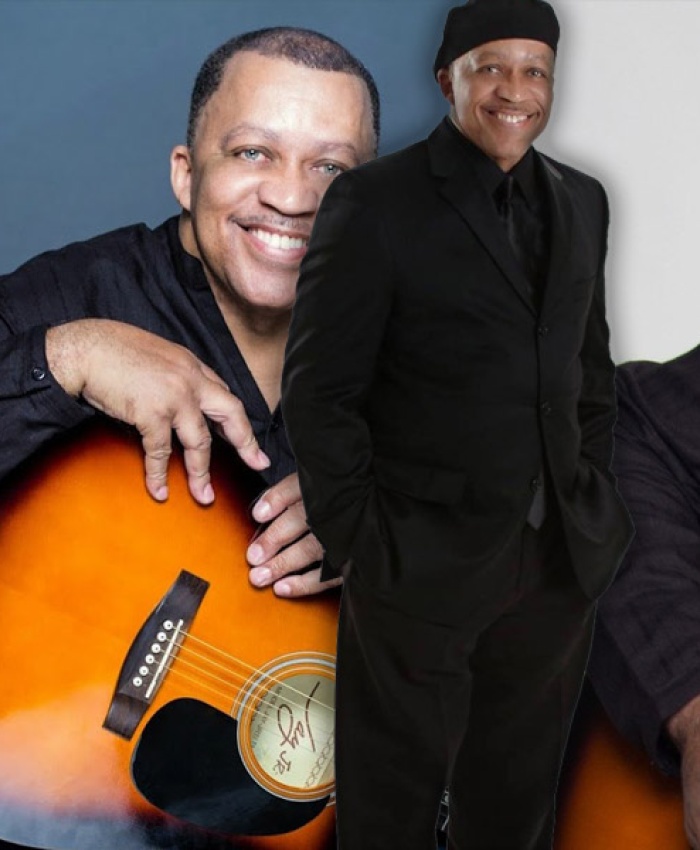 Gerald Harris holding a guitar
